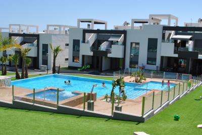 Apartamento en planta baja en Oasis Beach Punta Prima 8 Nº 039 in España Casas