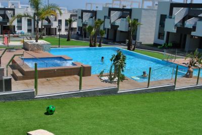 Apartamento en planta baja en Oasis Beach Punta Prima 8 Nº 039 in España Casas