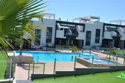 Appartement rez de chaussée à Oasis Beach Punta Prima 8 Nº 039 in España Casas